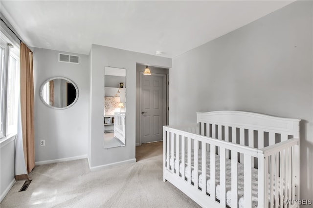 234 Misty Ln, Amherst, NY 14051 - bedroom with carpet floors, baseboards, and a nursery area