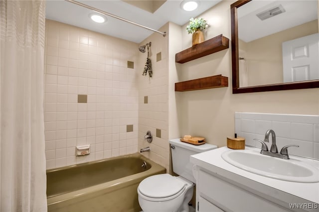 234 Misty Ln, Amherst, NY 14051 - bathroom with shower / bath combo with shower curtain, toilet, vanity, and recessed lighting