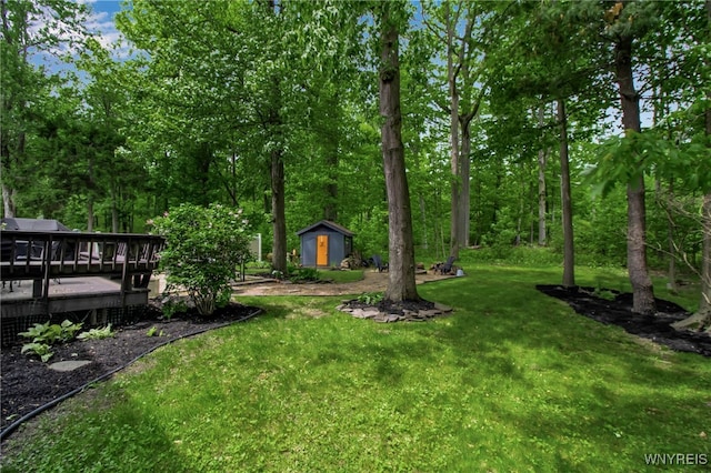 234 Misty Ln, Amherst, NY 14051 - view of green lawn with a wooden deck