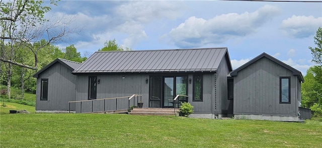 2185 Hog Mountain Rd, Middletown, NY 12455 - rear view of house featuring a yard, a standing seam roof, and metal roof