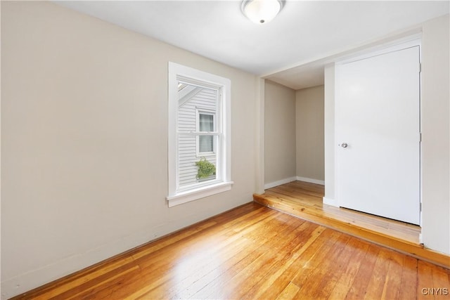 220 W Elm St, Oneida-Inside, NY 13421 - empty room featuring light wood-type flooring and baseboards