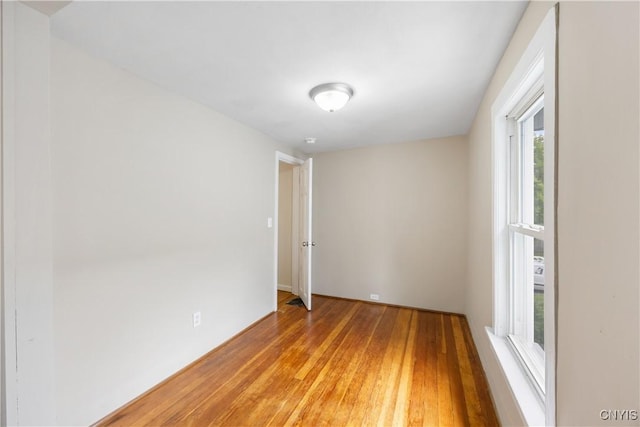 220 W Elm St, Oneida-Inside, NY 13421 - empty room featuring light wood-style flooring