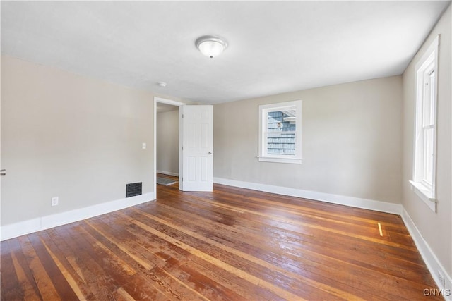 220 W Elm St, Oneida-Inside, NY 13421 - spare room featuring hardwood / wood-style floors, plenty of natural light, and baseboards