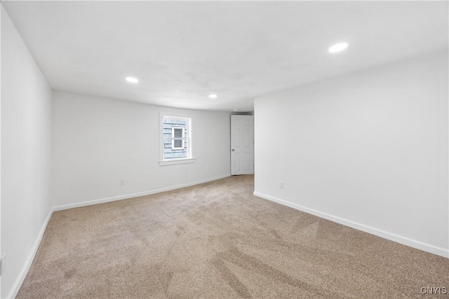220 W Elm St, Oneida-Inside, NY 13421 - carpeted empty room with recessed lighting and baseboards