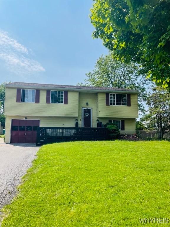 6954 Academy Ln, Lockport-Town, NY 14094 - raised ranch with an attached garage and asphalt driveway