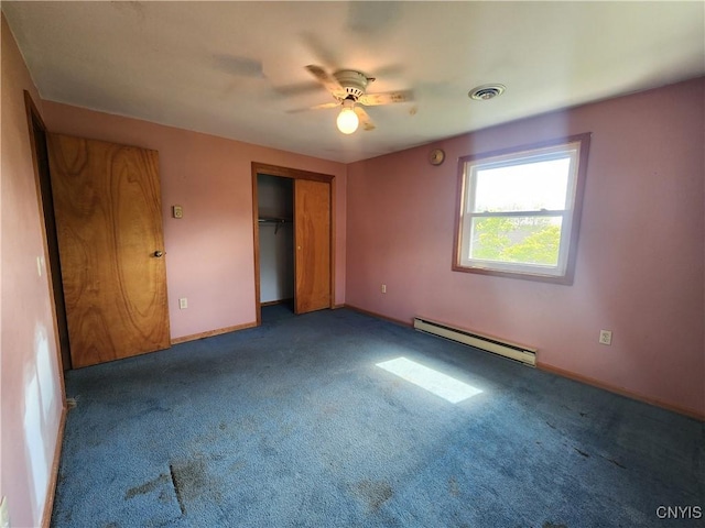 6 Heather Woods Ct, Skaneateles, NY 13152 - unfurnished bedroom featuring baseboard heating, carpet floors, a closet, and a ceiling fan