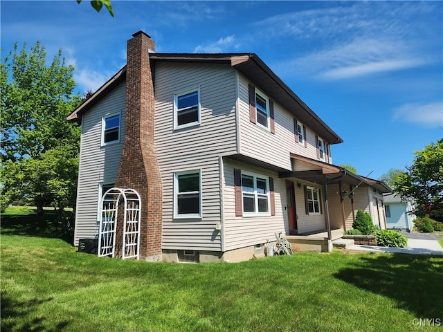 6 Heather Woods Ct, Skaneateles, NY 13152 - back of house featuring a chimney, a lawn, and covered porch