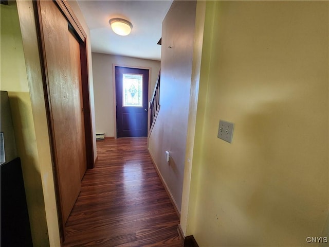 6 Heather Woods Ct, Skaneateles, NY 13152 - corridor featuring dark wood-style floors, a baseboard radiator, and stairs