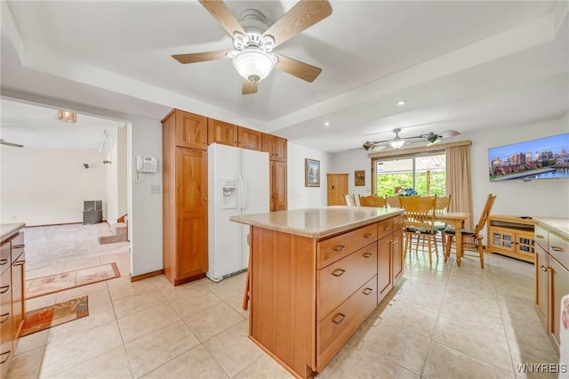 2350 Quaker Rd, Hartland, NY 14067 - kitchen featuring white refrigerator with ice dispenser, ceiling fan, light countertops, a center island, and recessed lighting