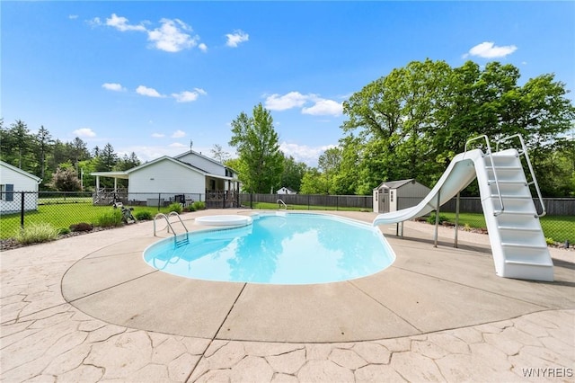 2350 Quaker Rd, Hartland, NY 14067 - view of pool with a water slide and view of wooded area