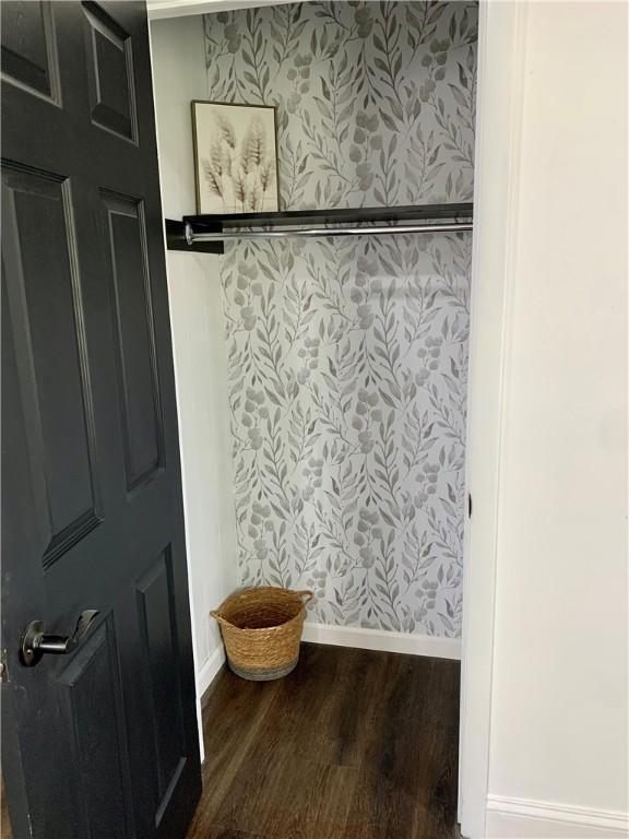 438 Hillview Ave, Southport, NY 14904 - mudroom with wood finished floors, baseboards, and wallpapered walls