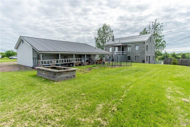 24401 Cheever Rd, Pamelia, NY 13601 - rear view of house featuring metal roof
