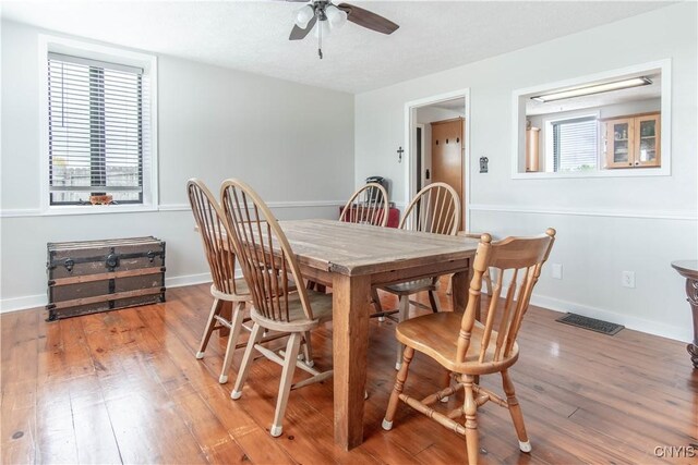24401 Cheever Rd, Pamelia, NY 13601 - dining area featuring ceiling fan, light wood finished floors, and baseboards