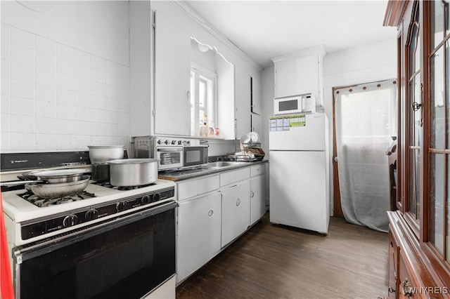 204 Crowley Ave, Buffalo, NY 14207 - kitchen with white appliances, dark wood-style floors, white cabinetry, and dark countertops