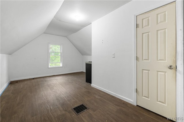 204 Crowley Ave, Buffalo, NY 14207 - bonus room with dark wood-style flooring, vaulted ceiling, and baseboards