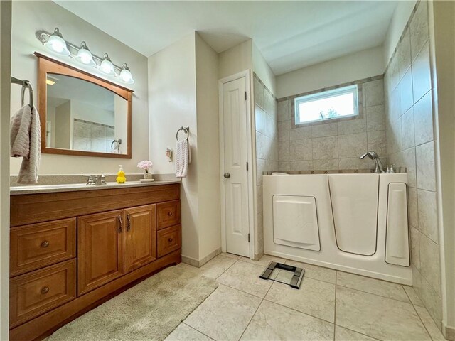 119 Park Ter, Big Flats, NY 14845 - full bathroom featuring vanity, tile patterned flooring, and a bath