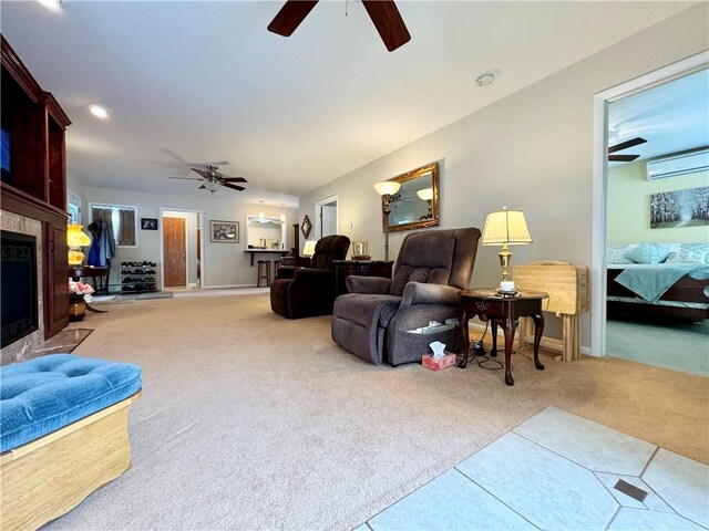 119 Park Ter, Big Flats, NY 14845 - living room featuring ceiling fan, light carpet, a tile fireplace, a wall mounted AC, and baseboards