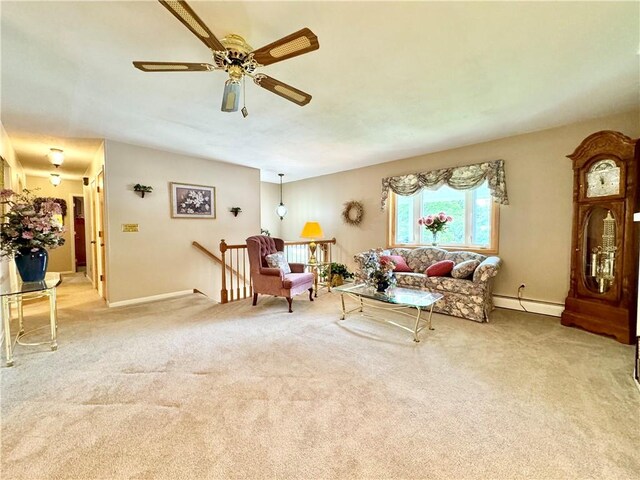 119 Park Ter, Big Flats, NY 14845 - carpeted living room featuring a baseboard radiator, ceiling fan, and baseboards