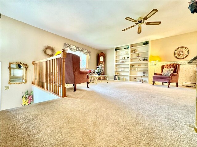 119 Park Ter, Big Flats, NY 14845 - living area featuring carpet floors, a ceiling fan, and a baseboard heating unit
