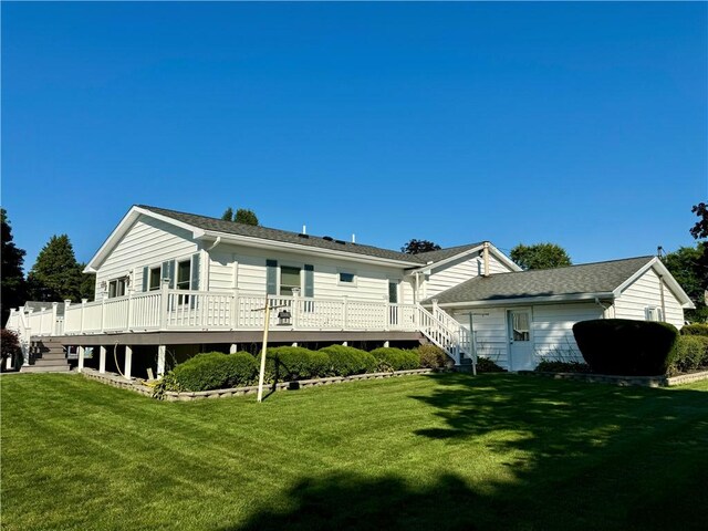 119 Park Ter, Big Flats, NY 14845 - back of house with stairs, a deck, and a lawn