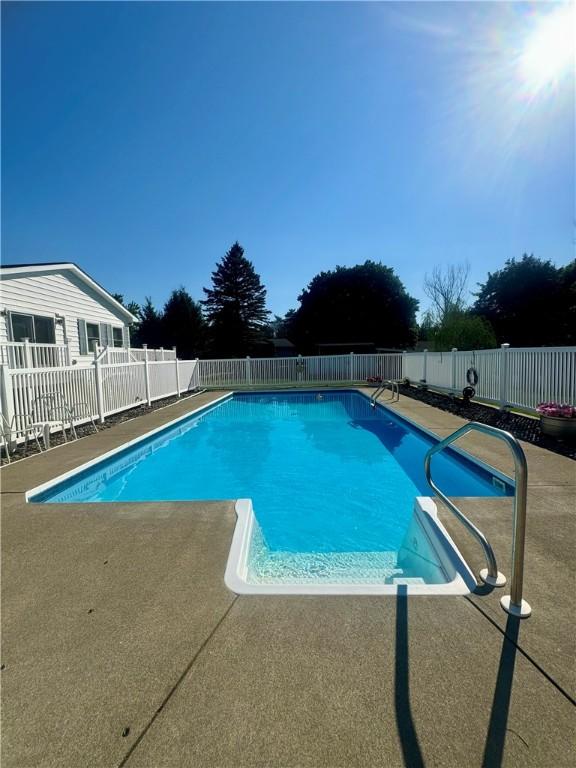 119 Park Ter, Big Flats, NY 14845 - view of pool with a fenced backyard and a patio