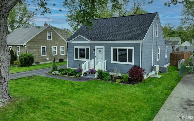 12 S Huxley Dr, Cheektowaga, NY 14225 - view of front of house featuring a shingled roof and central air condition unit