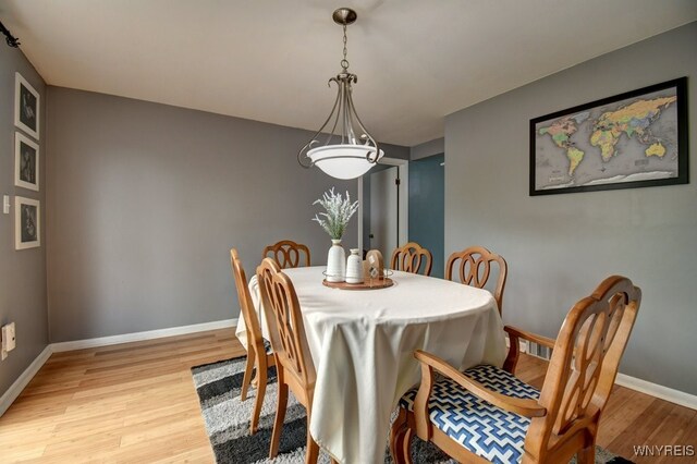 12 S Huxley Dr, Cheektowaga, NY 14225 - dining space featuring light wood-style flooring and baseboards