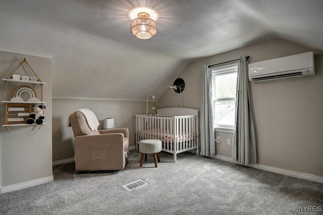 12 S Huxley Dr, Cheektowaga, NY 14225 - carpeted bedroom with a wall mounted AC, lofted ceiling, a nursery area, and baseboards