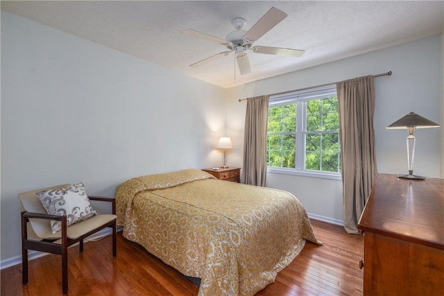 1108 Brick Landing Pl, Webster, NY 14580 - bedroom with hardwood / wood-style floors, baseboards, and ceiling fan