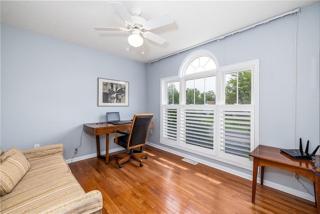 1108 Brick Landing Pl, Webster, NY 14580 - home office featuring wood finished floors, baseboards, and a ceiling fan
