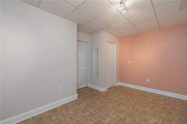 1108 Brick Landing Pl, Webster, NY 14580 - empty room featuring baseboards and a paneled ceiling