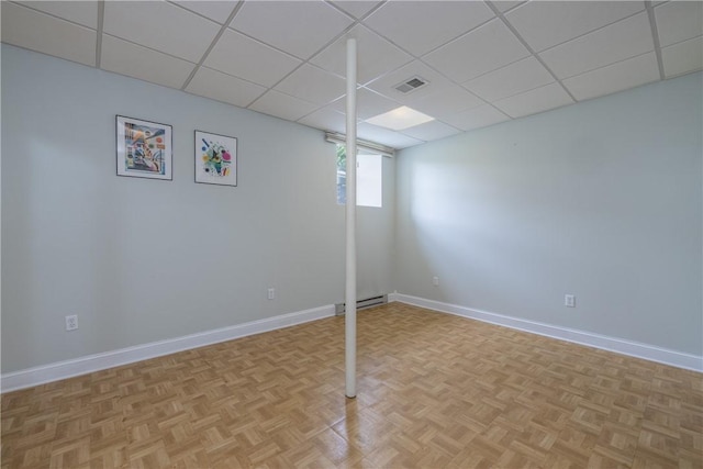1108 Brick Landing Pl, Webster, NY 14580 - basement with a paneled ceiling and baseboards