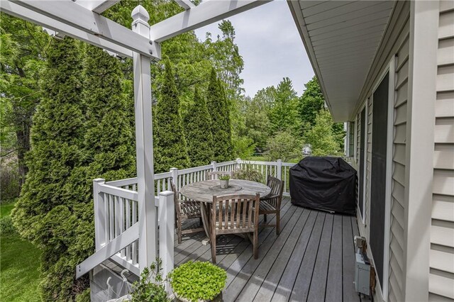 1108 Brick Landing Pl, Webster, NY 14580 - wooden terrace with outdoor dining area and a grill