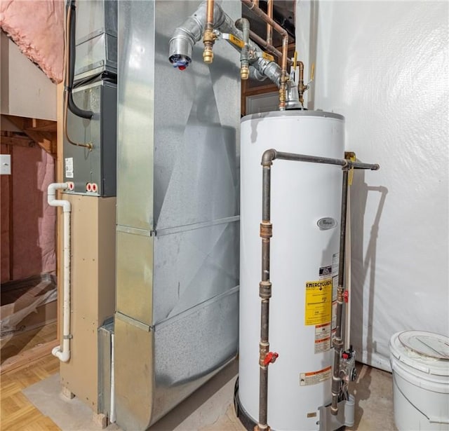 1108 Brick Landing Pl, Webster, NY 14580 - utility room with water heater and heating unit