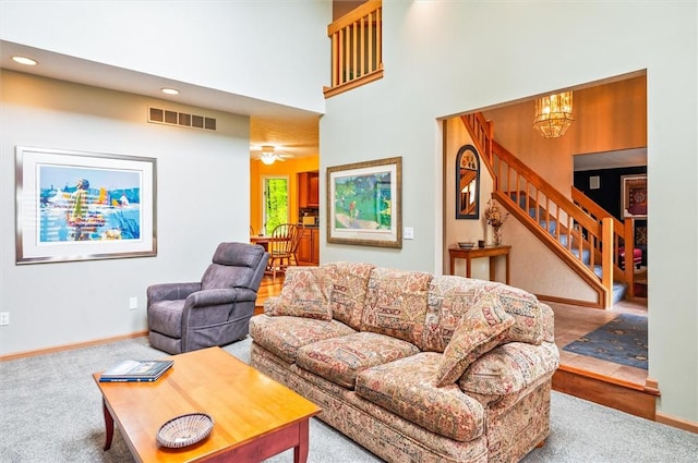 41 Pond Valley Cir, Penfield, NY 14526 - living area with stairs, carpet, baseboards, a chandelier, and recessed lighting