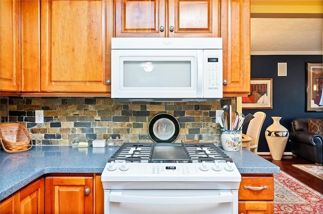 41 Pond Valley Cir, Penfield, NY 14526 - kitchen featuring white appliances, ornamental molding, tasteful backsplash, and brown cabinets