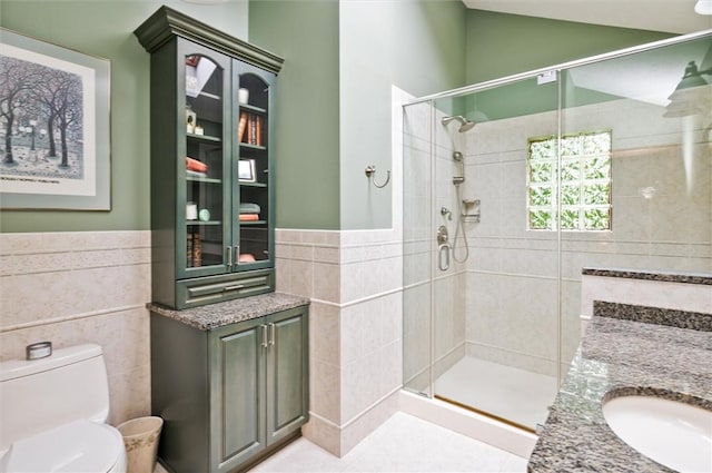 41 Pond Valley Cir, Penfield, NY 14526 - full bath with tile walls, a stall shower, toilet, vanity, and a wainscoted wall