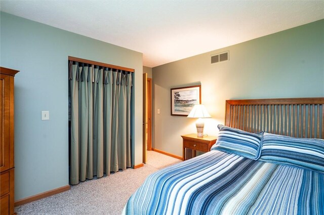41 Pond Valley Cir, Penfield, NY 14526 - bedroom featuring light colored carpet, baseboards, and a closet