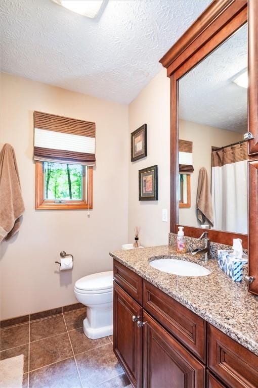 41 Pond Valley Cir, Penfield, NY 14526 - bathroom featuring vanity, toilet, a textured ceiling, baseboards, and tile patterned floors