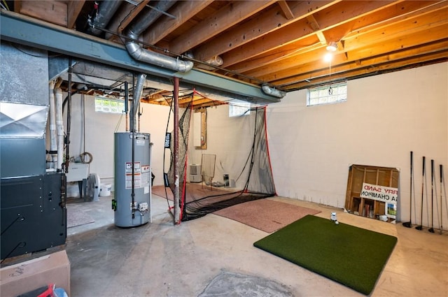 41 Pond Valley Cir, Penfield, NY 14526 - basement featuring gas water heater, heating unit, and a sink
