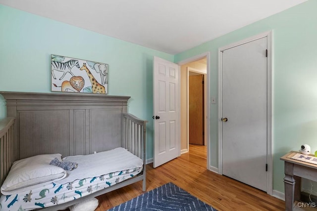 622 Stinard Ave, Syracuse, NY 13207 - bedroom featuring light wood-type flooring and baseboards