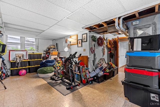 622 Stinard Ave, Syracuse, NY 13207 - below grade area with tile patterned floors and a drop ceiling