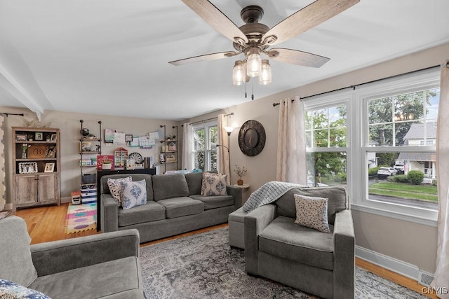 622 Stinard Ave, Syracuse, NY 13207 - living room with wood finished floors, baseboards, and a ceiling fan