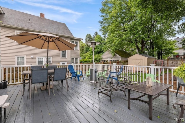 622 Stinard Ave, Syracuse, NY 13207 - wooden terrace featuring outdoor dining area and a fenced backyard