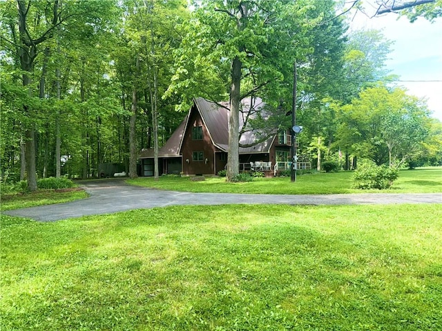 1476 Grange Hall Rd, Junius, NY 14532 - a-frame style home with a front lawn and metal roof
