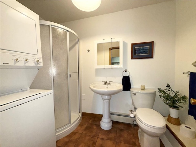 1476 Grange Hall Rd, Junius, NY 14532 - full bathroom featuring estacked washer and dryer, a baseboard radiator, a stall shower, and tile patterned flooring