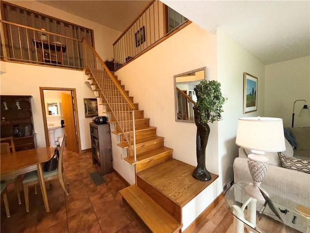 1476 Grange Hall Rd, Junius, NY 14532 - staircase featuring tile patterned flooring
