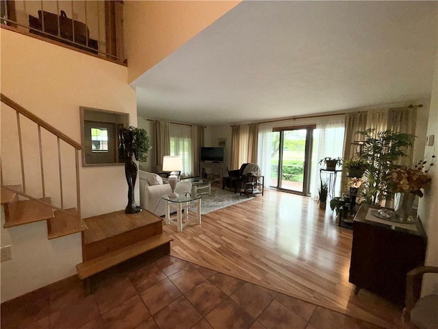 1476 Grange Hall Rd, Junius, NY 14532 - living area featuring stairway and tile patterned floors