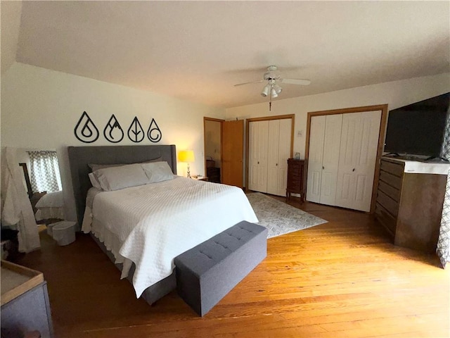 1476 Grange Hall Rd, Junius, NY 14532 - bedroom featuring multiple closets, wood finished floors, and ceiling fan