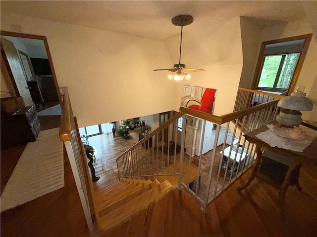 1476 Grange Hall Rd, Junius, NY 14532 - stairway with wood finished floors, ceiling fan, and vaulted ceiling